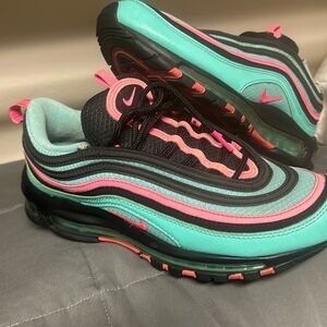 Air Max 97 Tiffany Blue with pink on black.